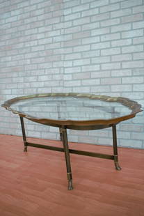 Hollywood Regency Labarge Brass Tray Top Oval Coffee Table: Vintage from the 1960s Materials: glass, metal, brass Width: 56 inches Height: 17 inches Depth: 30 inches Description: Hollywood Regency Labarge Brass Tray Top Oval Coffee Table Hollywood Regency LaBa