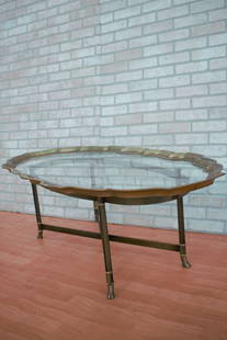 Hollywood Regency Labarge Brass Tray Top Oval Coffee Table: Vintage from the 1960sMaterials: glass, metal, brassWidth: 56 inchesHeight: 17 inchesDepth: 30 inches Description: Hollywood Regency Labarge Brass Tray Top Oval Coffee Table Hollywood Regency