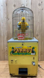 Vintage Talking Parrot Arcade Game Vending Machine: Vintage from the 1960s Materials: metal, plastic Description: Gray Hound (JPM) 25 Cent Talking Parrot “Prize Every Time” Vending Machine Talking Parrot Coin Operated Prize Arcade Game. Arc