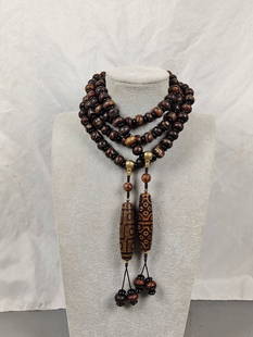 Two Dzi bead necklaces: Two Dzi bead necklaces. Peak is old and spicy. Each piece is 55cm long and the total weight is 467g. Reserve: $600.00 Shipping: Domestic: Shipping rates are determined by destination International: Fo