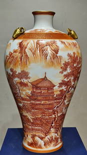 Carmine color landscape pattern deer head plum vase: Carmine red colored landscape pattern with deer head and plum blossom vase. The shape of the vessel is square, the glaze is thick and smooth, the color is as shown. Height 48cm, width 28cm Reserve: $5