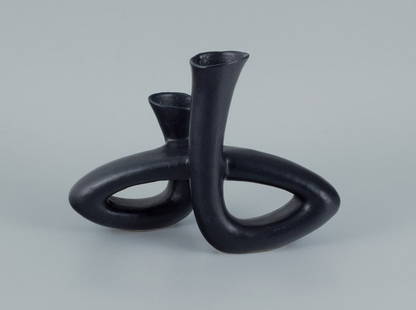 European studio ceramicist. Unique twisted vase in black glaze.: European studio ceramicist. Unique twisted vase in black glaze. Late 1900s. In perfect condition. Dimensions: Length 28.0 x Depth 12.0 Height 21.0 cm. Reserve: $308.00 Shipping: Domestic: Shipping rat