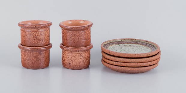 Stouby Keramik, Denmark, a set of four small handmade ceramic vases and four plates. Glazed in brown: Stouby Keramik, Denmark, a set of four small handmade ceramic vases and four plates. Glazed in brown and sandy tones. 1970s. Signed Stouby Denmark. In perfect condition. Vase: Height 5.1 cm, Diameter