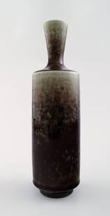 Large Berndt Friberg Studio pottery vase. Unique, handmade.: Large Berndt Friberg Studio pottery vase. Unique, handmade. Amazing Aniara glaze. 1978. Perfect. 1st. factory quality. Measures: 21 x 7 cm. Reserve: $910.00 Shipping: Domestic: Shipping rates are dete