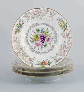 Royal Copenhagen, a set of four antique dinner plates with reticulated rim and leaf work.: Royal Copenhagen, a set of four antique dinner plates with reticulated rim and leaf work. Rare plates, hand painted with floral motifs. Juliane Marie stamp. Approx. 1900. In perfect condition. Second