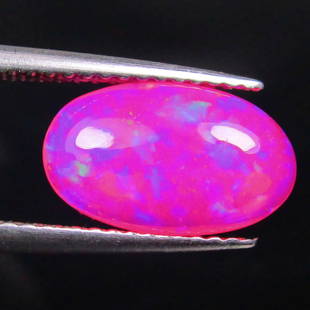 1.77 Ctw Natural Ethiopian Pink Fire Opal Oval Cab: No Reserve! Title: 1.77 Ctw Natural Ethiopian Pink Fire Opal Oval Cab Stone Clarity: Translucent Gemstones: Natural Pink Opal Carat Weights: 1.77 Size/Dimensions: 11.80 x 7.20 x 4.10 mm Additional Inf