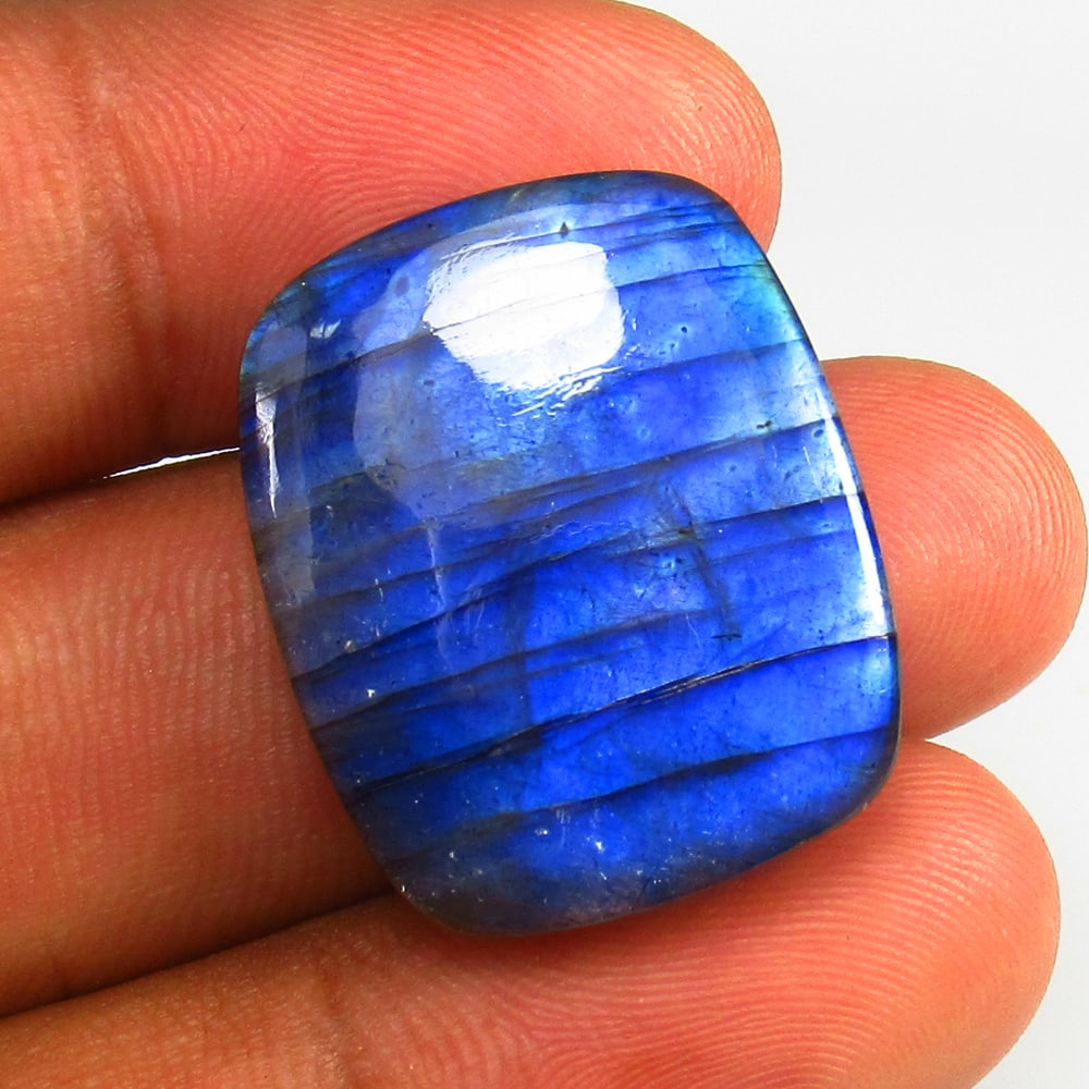 37.94 Ct - Natural Labradorite: No Reserve! Title: 37.94 Ct - Natural Labradorite Additional Information: Gemstone Gemstones: Labradoeite Carat Weights: 37.94 Size/Dimensions: 27.0 x 23.0 x 6.6 mm Additional Information: Pieces : 1