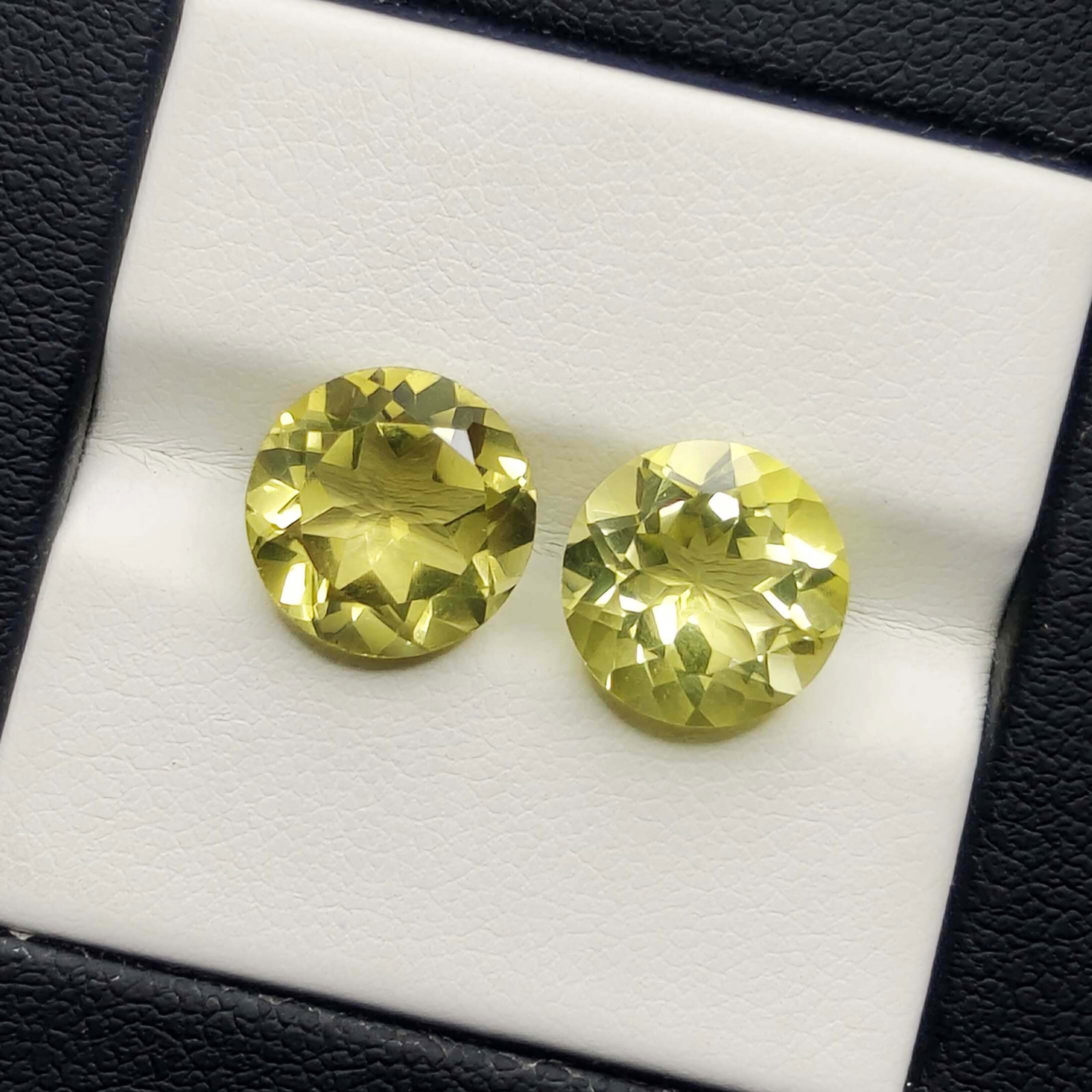 6.75 Ct Natural Green Lemon Quartz Pair: No Reserve! Title: 6.75 Ct Natural Green Lemon Quartz Pair Additional Information: Gemstones: Natural Lemon Quartz Carat Weights: 6.75 ct Size/Dimensions: 10 X 10 X 6 mm Materials & Techniques: Quartz