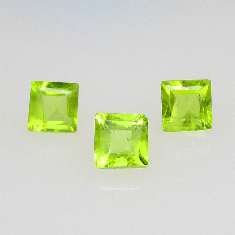 1.45 Ctw Natural Pakistan Peridot Square Set: No Reserve! Title: 1.45 Ctw Natural Pakistan Peridot Square Set Stone Clarity: VVS Gemstones: Natural Peridot Carat Weights: 1.45 Size/Dimensions: 4.0x4.0 - 4.3x4.3 mm / 3 Pc's Additional Information: