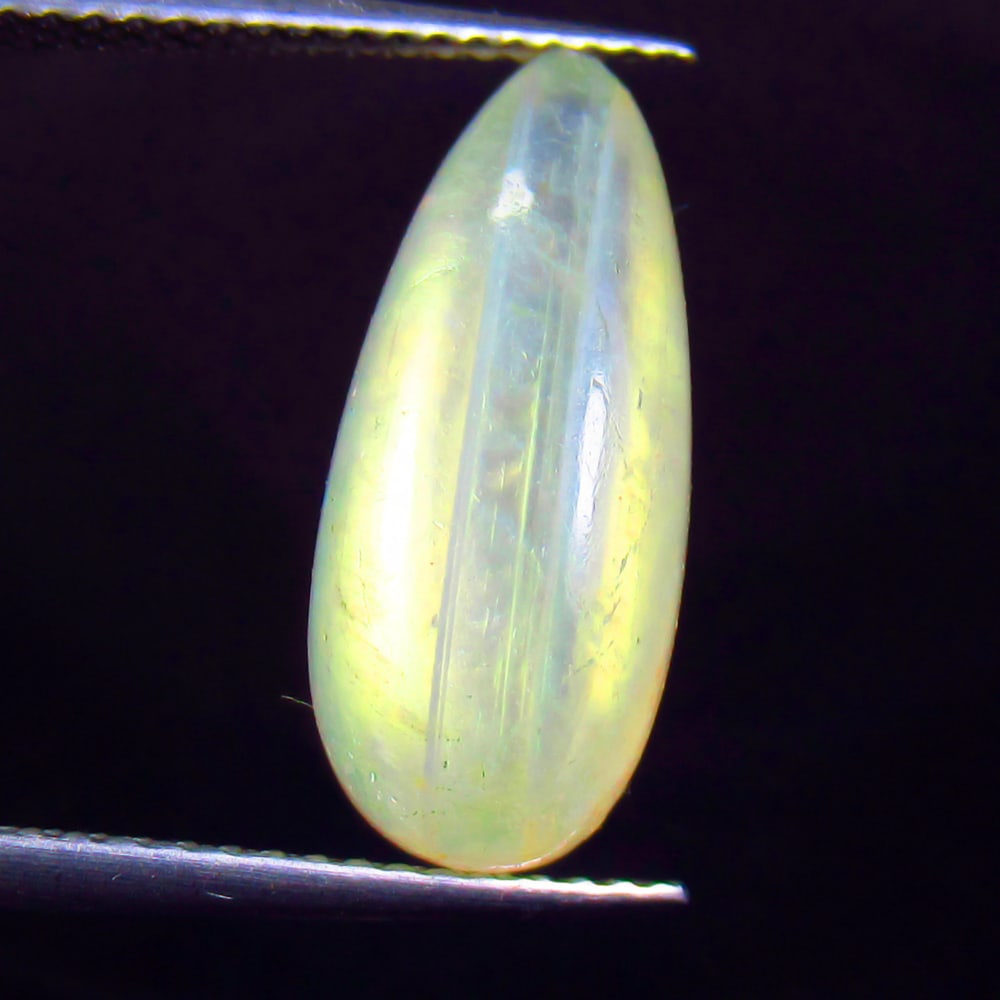 6.75 Ctw Natural Blue Moonstone Pear Cab: No Reserve! Title: 6.75 Ctw Natural Blue Moonstone Pear Cab Stone Clarity: Transparent Gemstones: Natural Moonstone Carat Weights: 6.75 Size/Dimensions: 17.80 x 7.70 x 6.20 mm Additional Information: