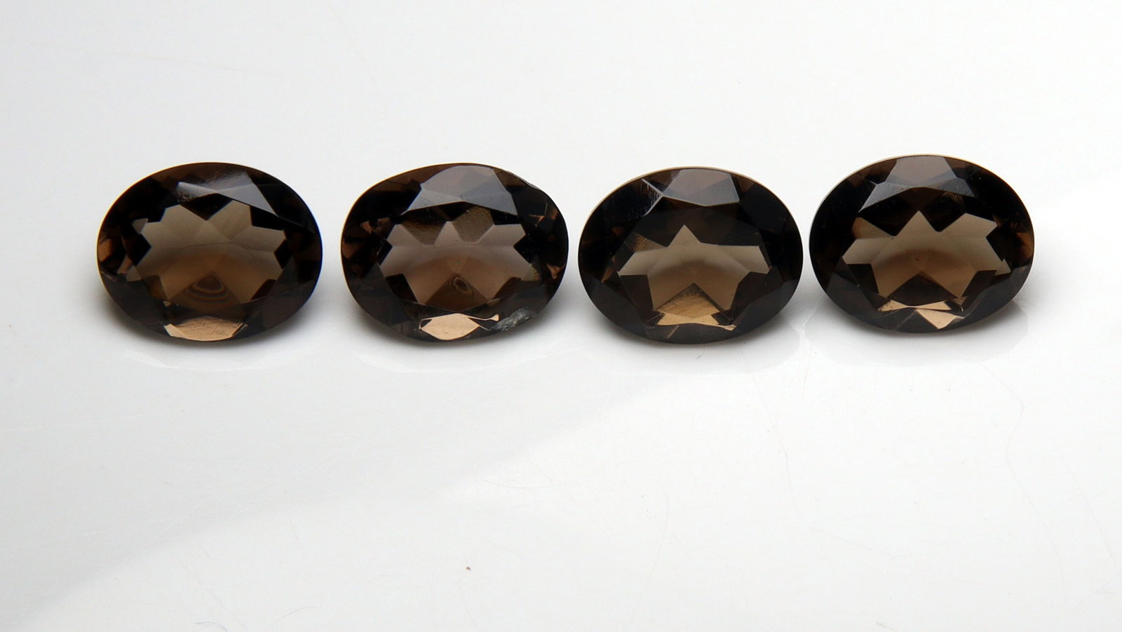 Awesome " Natural Smoky Quartz " 9.71 Cts Natural Smoky Quartz Pair: No Reserve! Title: Awesome " Natural Smoky Quartz " 9.71 Cts Natural Smoky Quartz Pair Additional Information: Gemstone : Natural Smoky Quartz Shape and cut : Oval Cut Origin : Africa Weight : 9.71 ca