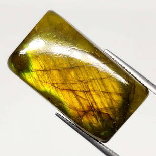 49.90 Ct "Stunning" Golden Fire Labradorite: No Reserve! Title: 49.90 Ct "Stunning" Golden Fire Labradorite Additional Information: Gemstones: Natural Labradorite Carat Weights: 49.90 ct Size/Dimensions: 29 X 17 X 9 mm Treatment: Color Dyed Mate