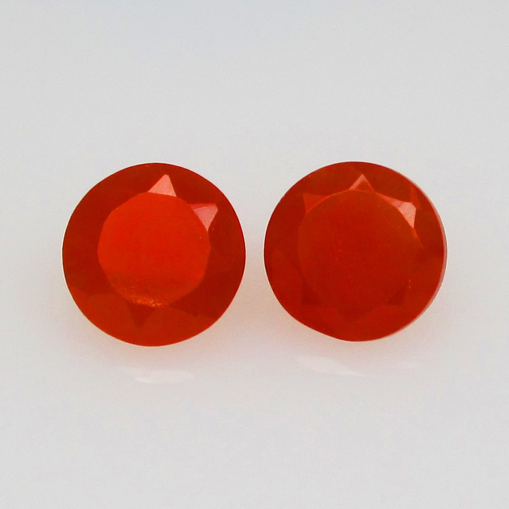 2.29 Ctw Natural Orange Carnelian Round Pair: No Reserve! Title: 2.29 Ctw Natural Orange Carnelian Round Pair Stone Clarity: Semi-Transparent Gemstones: Natural Carnelian Carat Weights: 2.29 Size/Dimensions: 7.20 x 7.20 x 4.20 mm / 2 Pc's Additio