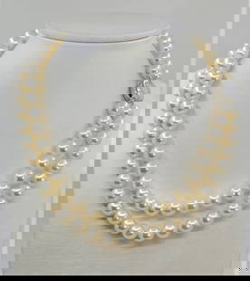 Exceptional - 9x9.5mm Double Akoya Pearl - Necklace: Title: Exceptional - 9x9.5mm Double Akoya Pearl - Necklace Description: A beautiful double pearl necklace of white saltwater Akoya pearls with exceptional lustre, finished with a 925 sterling silver c