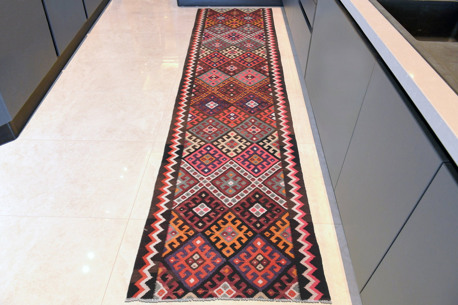 1970s Kilim Oushak Handmade Wool Rug: Title: 1970s Kilim Oushak Handmade Wool Rug Origin: Turkey Date/Period: 1960 - 1970 Materials: Wool and Cotton Size: Dimensions: 3x12.6 ft (90x384 cm) Description: This Turkish one-of-a-kind Vintage F