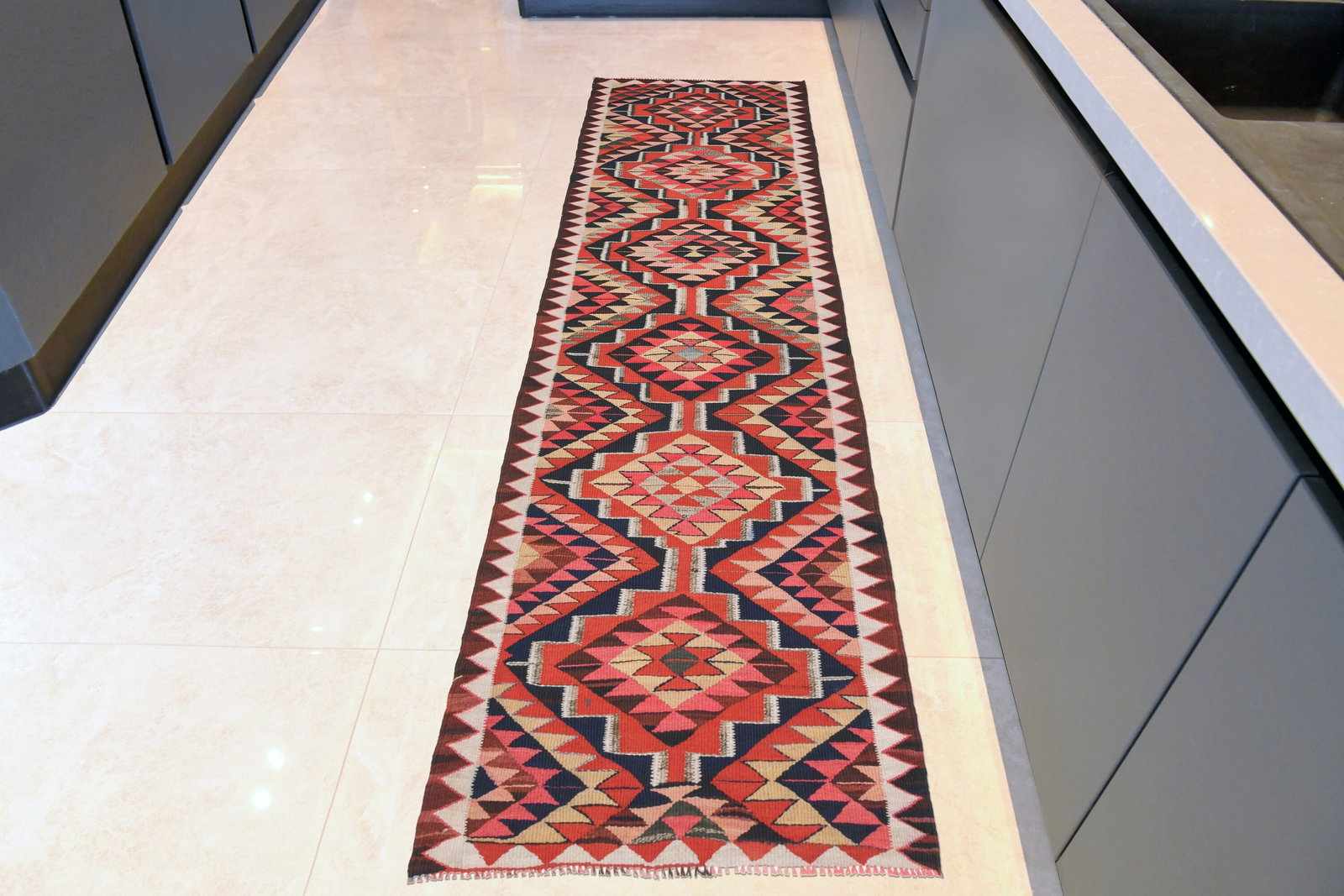 1970s Kilim Oushak Handmade Wool Rug: Title: 1970s Kilim Oushak Handmade Wool Rug Origin: Turkey Date/Period: 1960 - 1970 Materials: Wool and Cotton Size: Dimensions: 3.1x10.8 ft (95x329 cm) Description: This Turkish one-of-a-kind Vintage