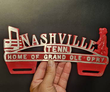 Aluminum Nashville License Plate Fob Topper: 9 3/4" wide 4 3/4" Tall Wonderful reproduction license plate topper. Good detail aluminum, slightly aged to look like an antique. Certainly hard to tell its age. Reserve: $20.00 Shipping:Domestic: