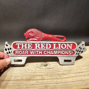 Aluminum Red Lion License Plate Fob Topper: 10 1/2" Wide x 4 1/2" Tall Wonderful reproduction license plate topper. Good detail aluminum, slightly aged to look like an antique. Certainly hard to tell its age. Reserve: $25.00 