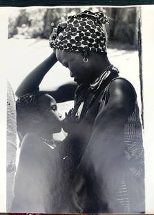Roy DeCavara Photograph UnSigned African art 1960 1970 woman breast feeding: Roy Decavara (1919-2009). Famous Photographer . Best known for his photographs of Harlem. I purchased several pieces from a collection. UnSigned on the back. Photos were preserved in a album so kept t