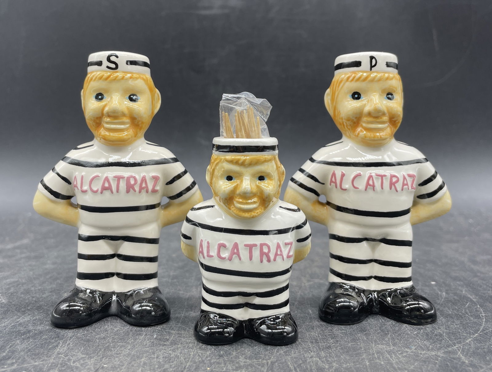 VINTAGE ALCATRAZ INMATE PRISONERS SALT PEPPER SHAKERS TOOTHPICK HOLDER: Title: VINTAGE ALCATRAZ INMATE PRISONERS SALT PEPPER SHAKERS TOOTHPICK HOLDER Date/Period: unknown Dimension: tallest approx 4" Material: CERAMIC Additional Information: VINTAGE ALCATRAZ INMATE PRISON