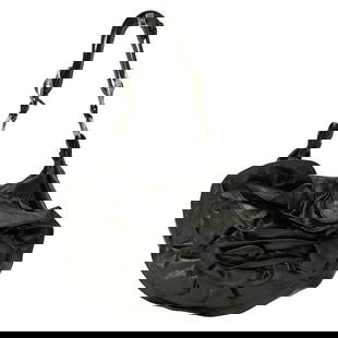 YVES SAINT LAURENT "Nadja Rose" bag in black leather: Title: YVES SAINT LAURENT "Nadja Rose" bag in black leather Materials: Leather Measurements/Size: MEASURES: Length 30 cm, Height 22 cm Description: (4780). "Nadja Rose" bag in black leather MADE IN: I