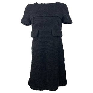 Chanel Black Wool Tweed Short Sleeves Mini Dress Size 38: Title: Chanel Black Wool Tweed Short Sleeves Mini Dress Size 38Description: Product details: Featuring crew neck, dual front imitated pockets, short sleeves, front lit, rear black zip closure with CC