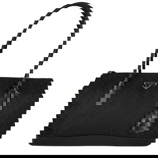PRADA unisex shoulder bag in nylon and black leather: Title: PRADA unisex shoulder bag in nylon and black leather Materials: Nylon Measurements/Size: DIMENSIONS: L: 36 cm - H: 21 cm - W: 11 cm - Handles 22 cm Description: (5181B168). Prada unisex shoulde