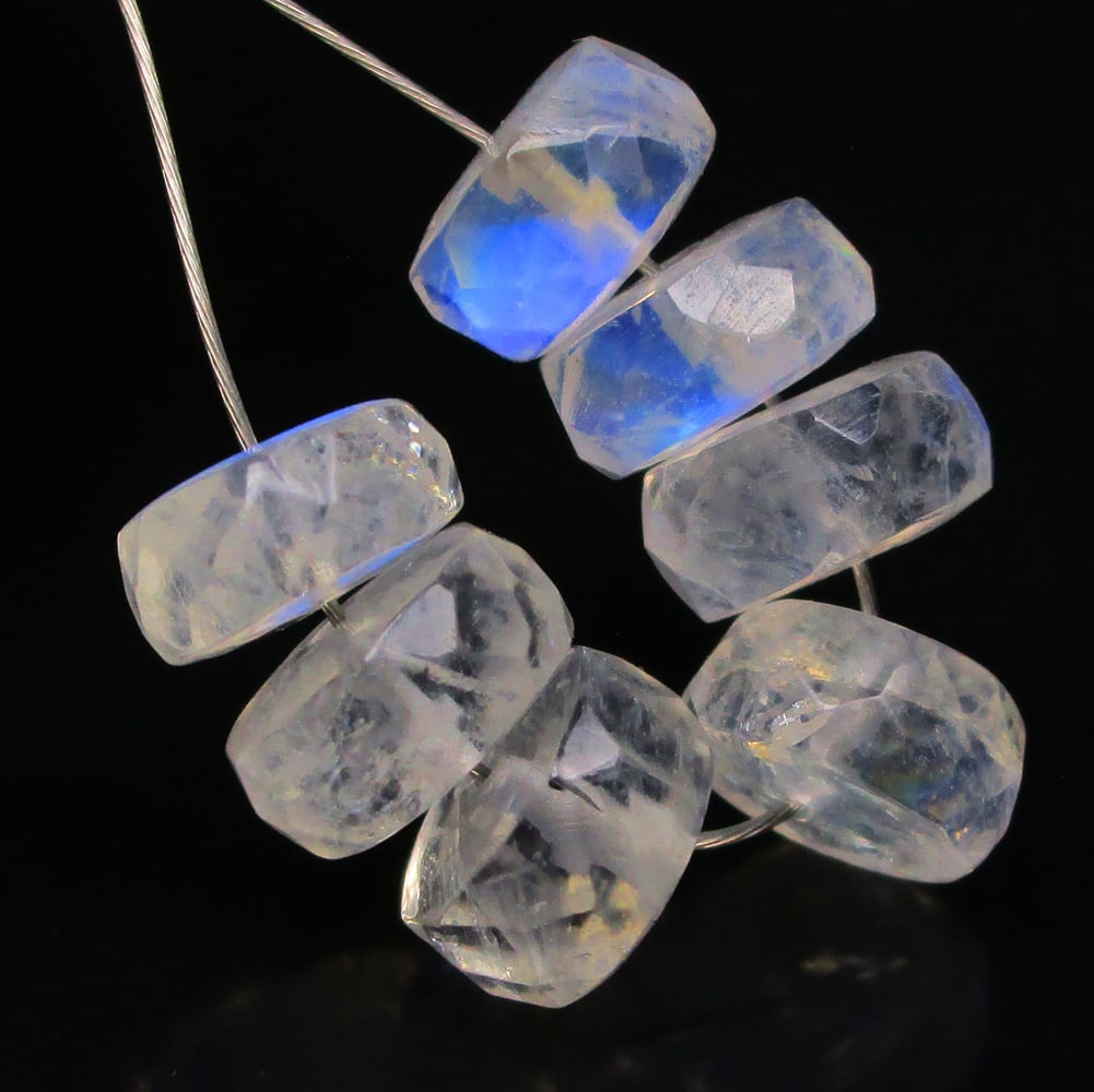 8.14 Ctw Natural 7 Drilled Blue Moonstone Round Beads: No Reserve! Title: 8.14 Ctw Natural 7 Drilled Blue Moonstone Round Beads Stone Clarity: Semi-Transparent Gemstones: Natural Moonstone Beads Carat Weights: 8.14 Size/Dimensions: 6.30 - 6.60 mm / 7 PC's