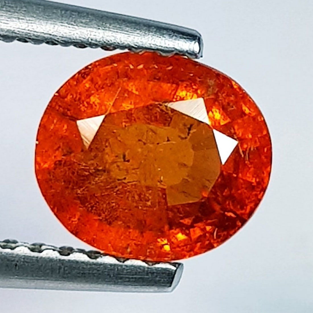1.70 ctz" Beautiful Fanta Orange " Natural Spessartite Garnet: No Reserve! Title: 1.70 ctz" Beautiful Fanta Orange " Natural Spessartite Garnet Color/Clarity: Orange / VS Gemstone: Garnet Carat Weights: 1.7 Size: 7.10 x 6.20 x 4.00 Additional Information: Oval / 
