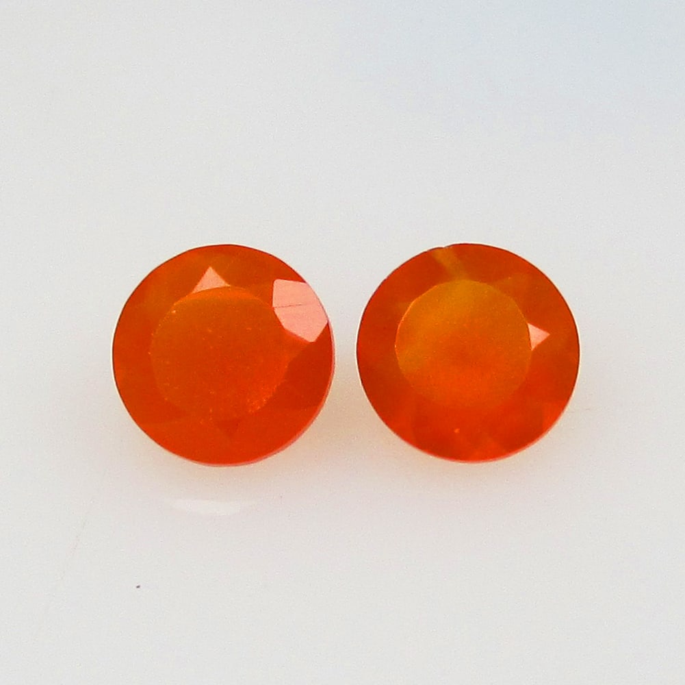 2.29 Ctw Natural Orange Carnelian Round Pair: No Reserve! Title: 2.29 Ctw Natural Orange Carnelian Round Pair Stone Clarity: Semi-Transparent Gemstones: Natural Carnelian Carat Weights: 2.29 Size/Dimensions: 7.10 x 7.10 x 4.50 mm / 2 Pc's Additio