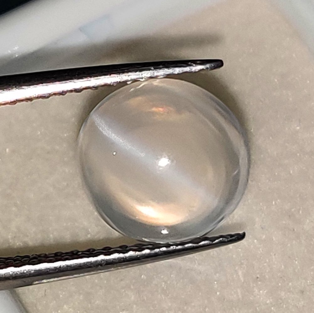 2.76 Ctw Natural Moonstone Round Cab: No Reserve! Title: 2.76 Ctw Natural Moonstone Round Cab Stone Clarity: Translucent Gemstones: Natural Moonstone Carat Weights: 2.76 Size/Dimensions: 9.10 x 8.90 x 5.00 mm Additional Information: Excel