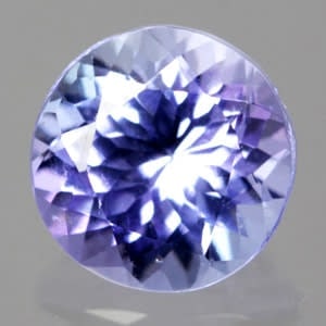 Natural Tanzanite 0.42ct Round Violetish/Pinkish VVS: Title: Natural Tanzanite 0.42ct Round Violetish/Pinkish VVS Additional Information: 1 x Natural Tanzanite 0.42ct Round Violetish/Pinkish VVS - Shape: Round Cut - Weight: 0.42ct - Colour: Violetish/Pin