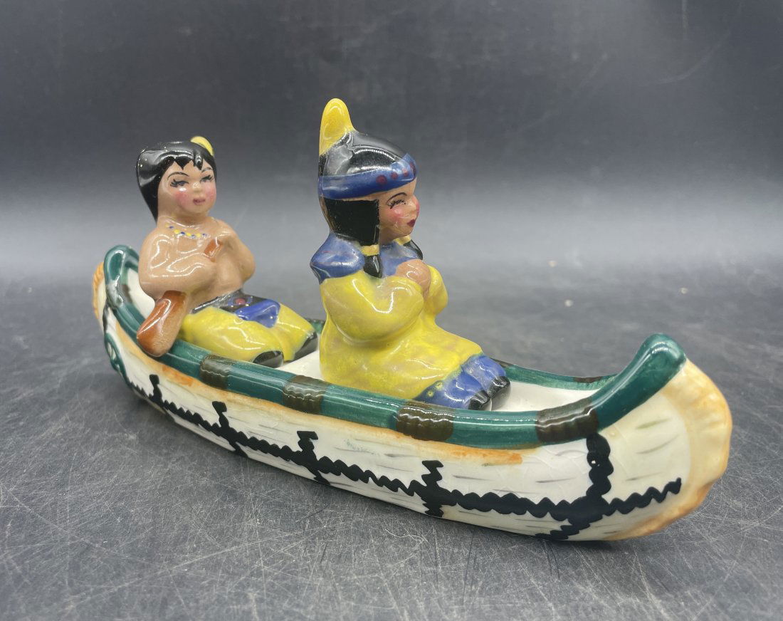 VINTAGE NATIVE AMERICAN INDIANS IN CANOE SALT AND PEPPER SHAKER SET: Title: VINTAGE NATIVE AMERICAN INDIANS IN CANOE SALT AND PEPPER SHAKER SETDate/Period: APPROX 1950'SDimension: CANOE 7" LONGMaterial: CERAMICAdditional Information: VINTAGE NATIVE AMERICAN INDIANS IN