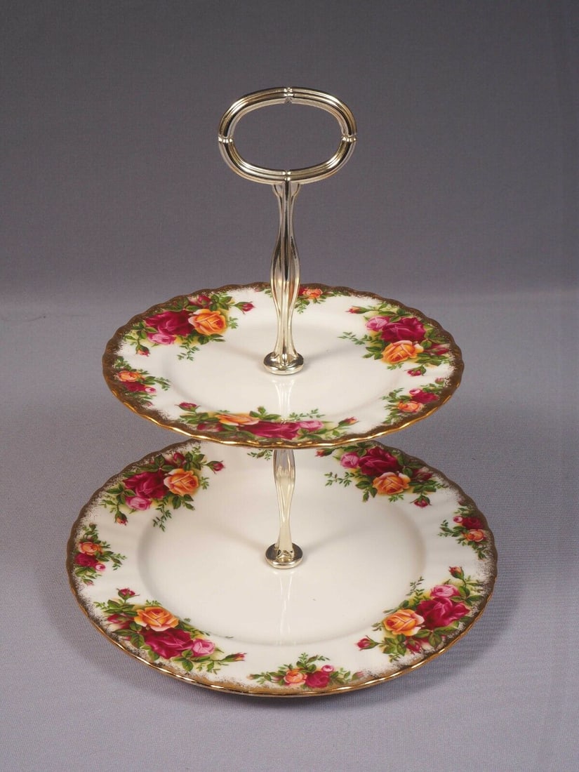 Royal Albert Old Country Roses 2 tier Cake Cake Stand Dish Snack Cookie Tray: This is a gorgeous Bone China 2 tier Cake Stand/Cookie Tray. It is from the renowned Royal Albert Old Country Roses collection - Made in England. The rims of this pattern are surrounded in blooming sp