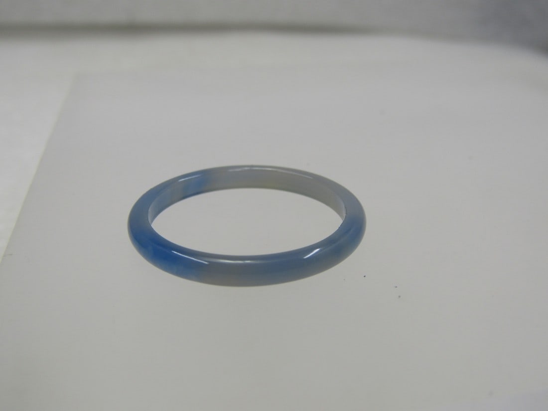 Blue Jadeite Band Ring, Sz. 10.25, 2.5mm: Blue Jadeite Band Ring, Sz. 10.25, 2.5mm. Band ring that is rounded on the outside and flat on the inside. Tests as jade/jadeite. Very good condition. It is not marked or signed. Age is appx. 1990's o