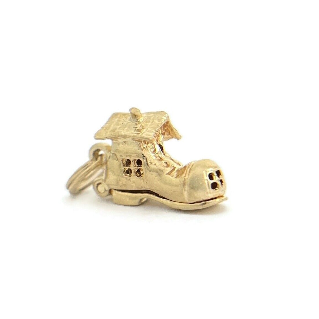 Vintage 1950's Old Woman Who Lived in a Shoe Charm 14K Yellow Gold, 3.22 Grams: Vintage 1950's Old Woman Who Lived in a Shoe Charm 14K Yellow Gold, 3.22 Grams This is such a lovely charm of the nursery rhyme, There Was An Old Woman Who Lived in a Shoe, featuring a family inside. 