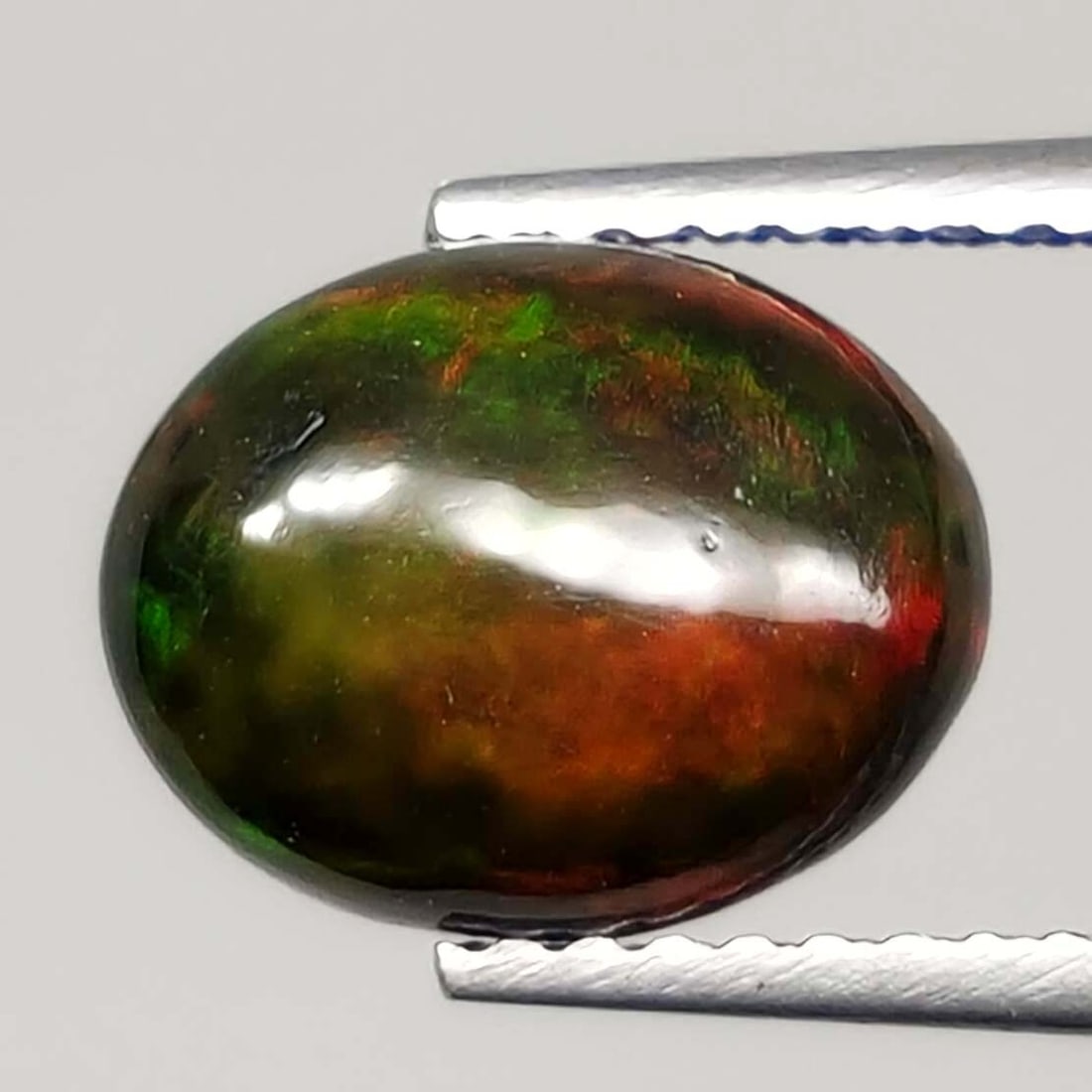 1.65 Ct "Play Of Colors" Natural Black Opal (1 of 3)
