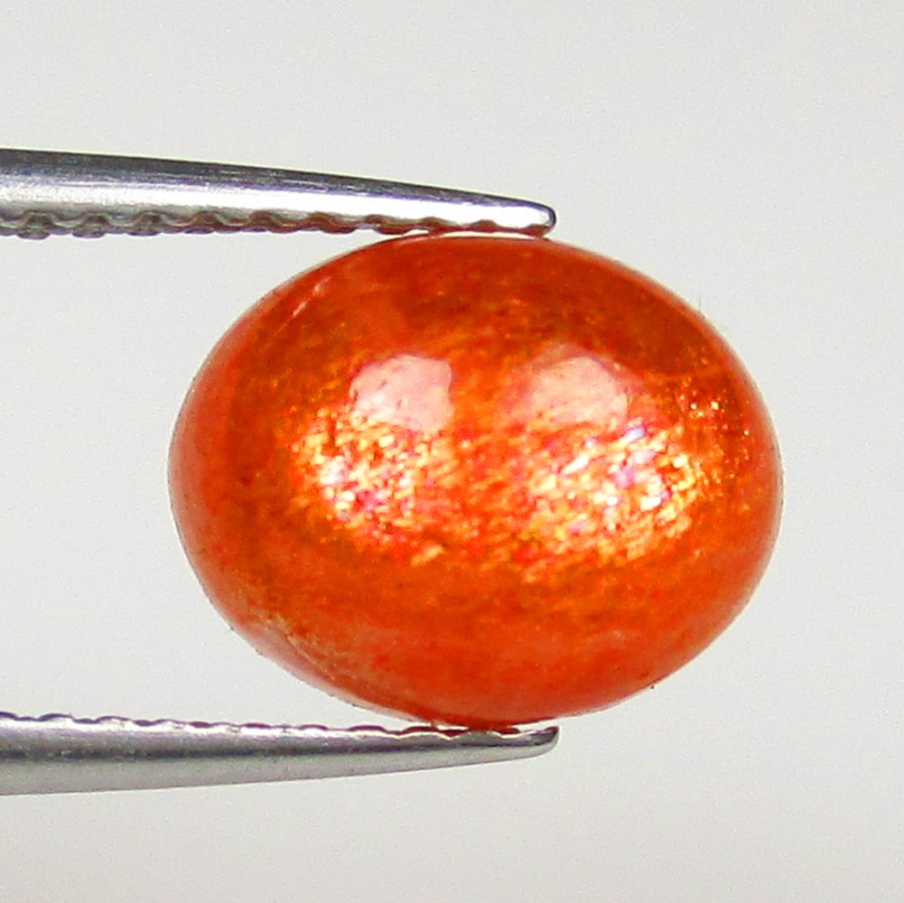 2.45 Ctw Natural Sunstone Oval Cab: No Reserve! Title: 2.45 Ctw Natural Sunstone Oval Cab Stone Clarity: Opaque Gemstones: Natural Sunstone Carat Weights: 2.45 Size/Dimensions: 9.40 x 7.70 x 4.70 mm Additional Information: Excellent Ova