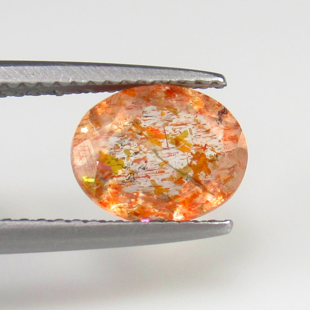 Natural Feldspar - 1.69 Ct: No Reserve! Title: Natural Feldspar - 1.69 Ct Origin: Turkey Weight: 1.69 Size/Dimensions: 9.0 x 7.0 x 4.1 mm Additional Information: Pieces : 1 No's / Shape : Oval Cut / Color : Orange / Clarity : VV