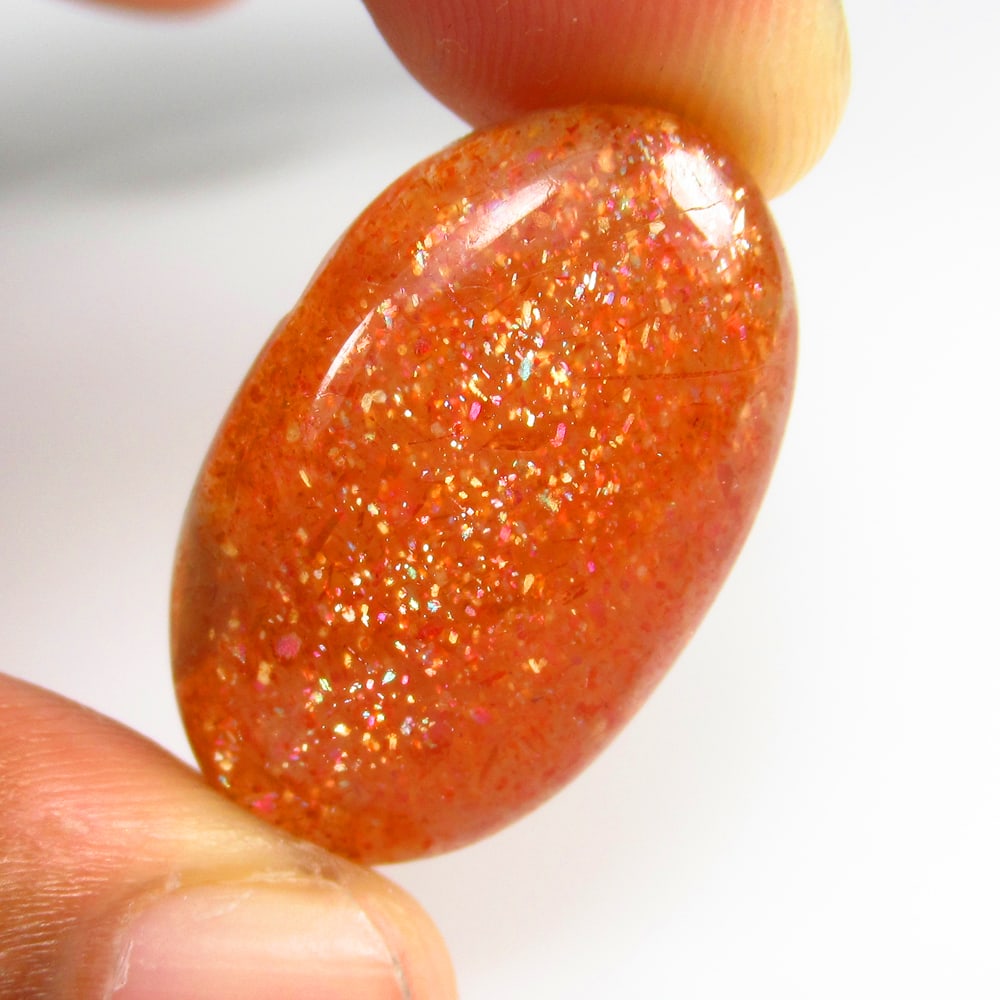 24.57 Ct - Natural Sunstone: No Reserve! Title: 24.57 Ct - Natural Sunstone Additional Information: Gemstone Gemstones: Sunstone Carat Weights: 24.57 Size/Dimensions: 28.0 x 17.0 x 6.6 mm Additional Information: Pieces : 1 No's /