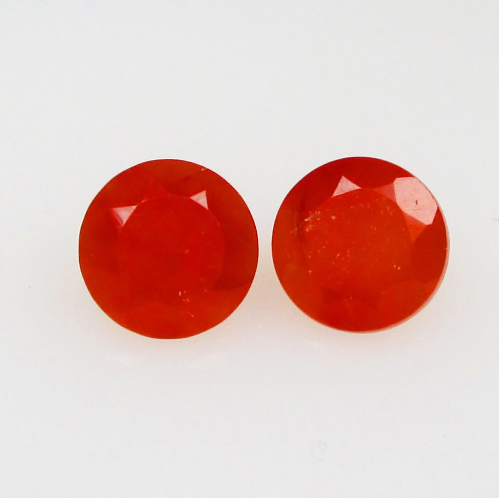 2.31 Ctw Natural Orange Carnelian Round Pair: No Reserve! Title: 2.31 Ctw Natural Orange Carnelian Round Pair Stone Clarity: Semi-Transparent Gemstones: Natural Carnelian Carat Weights: 2.31 Size/Dimensions: 7.20 x 7.20 x 4.40 mm / 2 Pc's Additio