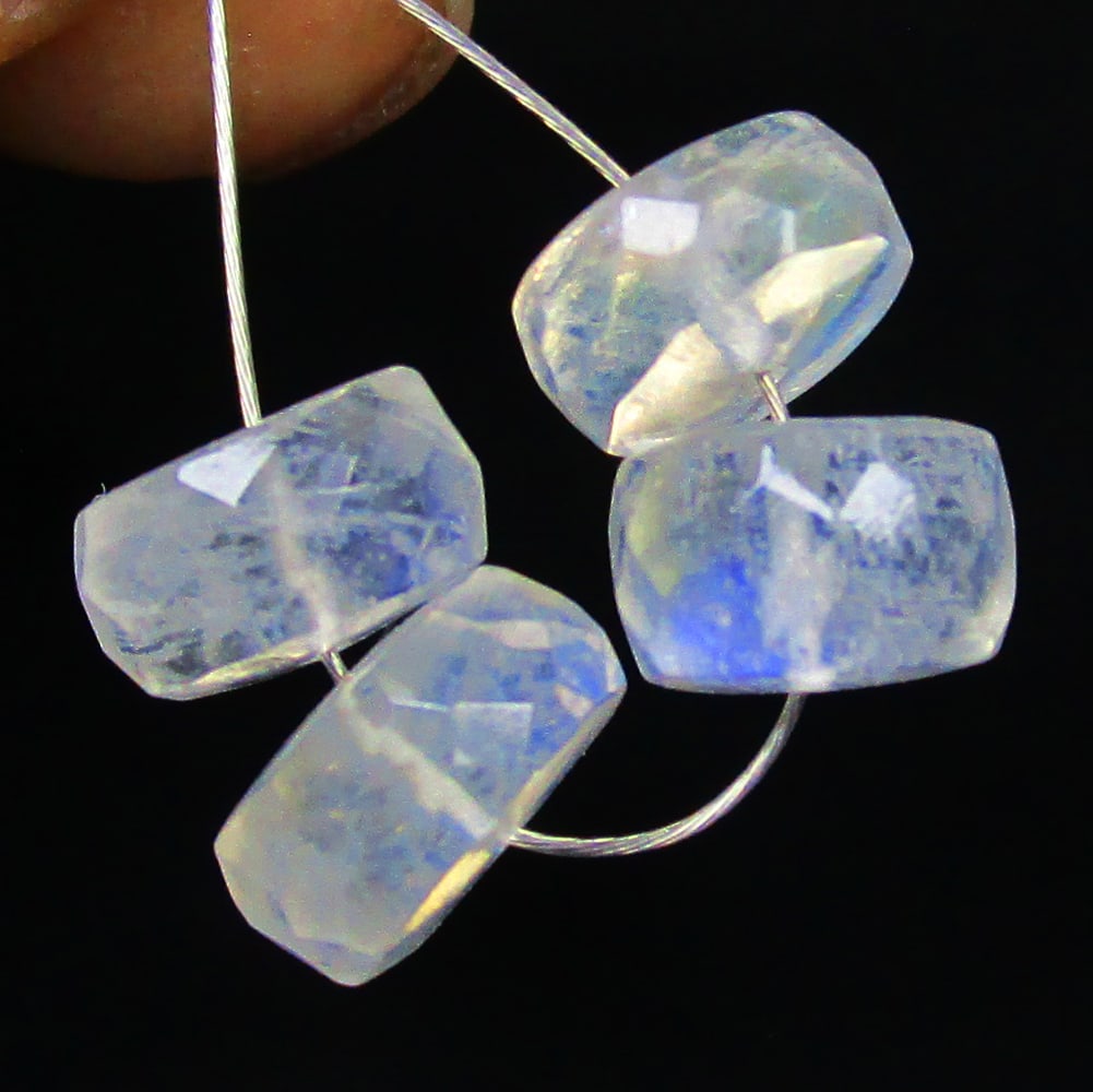 7.81 Ctw Natural 4 Drilled Blue Moonstone Round Beads: No Reserve! Title: 7.81 Ctw Natural 4 Drilled Blue Moonstone Round Beads Stone Clarity: Semi-Transparent Gemstones: Natural Moonstone Beads Carat Weights: 7.81 Size/Dimensions: 7.20 - 7.90 mm / 4 PC's