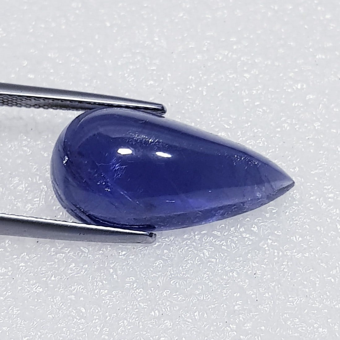 13.71 ctz Fine Collection of NaturalLCabochon Iolite: No Reserve! Title: 13.71 ctz Fine Collection of NaturalLCabochon Iolite Color/Clarity: Blue / VS Gemstone: Sapphire Carat Weights: 13.71 Size: 23.15 x 12.00 x 8.20 Additional Information: Pear Cabocho