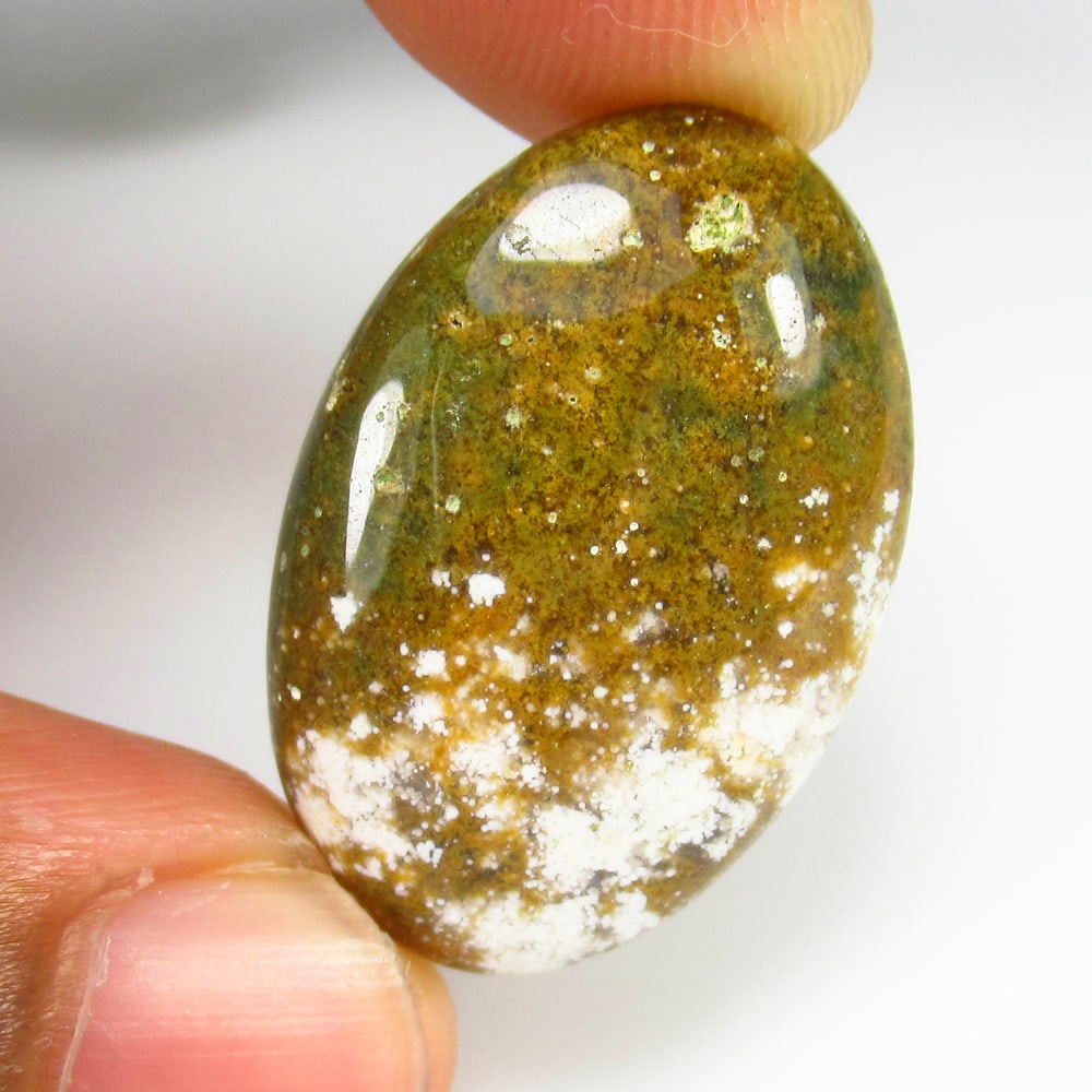 21.84 Ct - Natural Jasper: No Reserve! Title: 21.84 Ct - Natural Jasper Additional Information: Gemstone Gemstones: Jasper Carat Weights: 21.84 Size/Dimensions: 28.0 x 18.5 x 5.3 mm Additional Information: Pieces : 1 No's / Sha