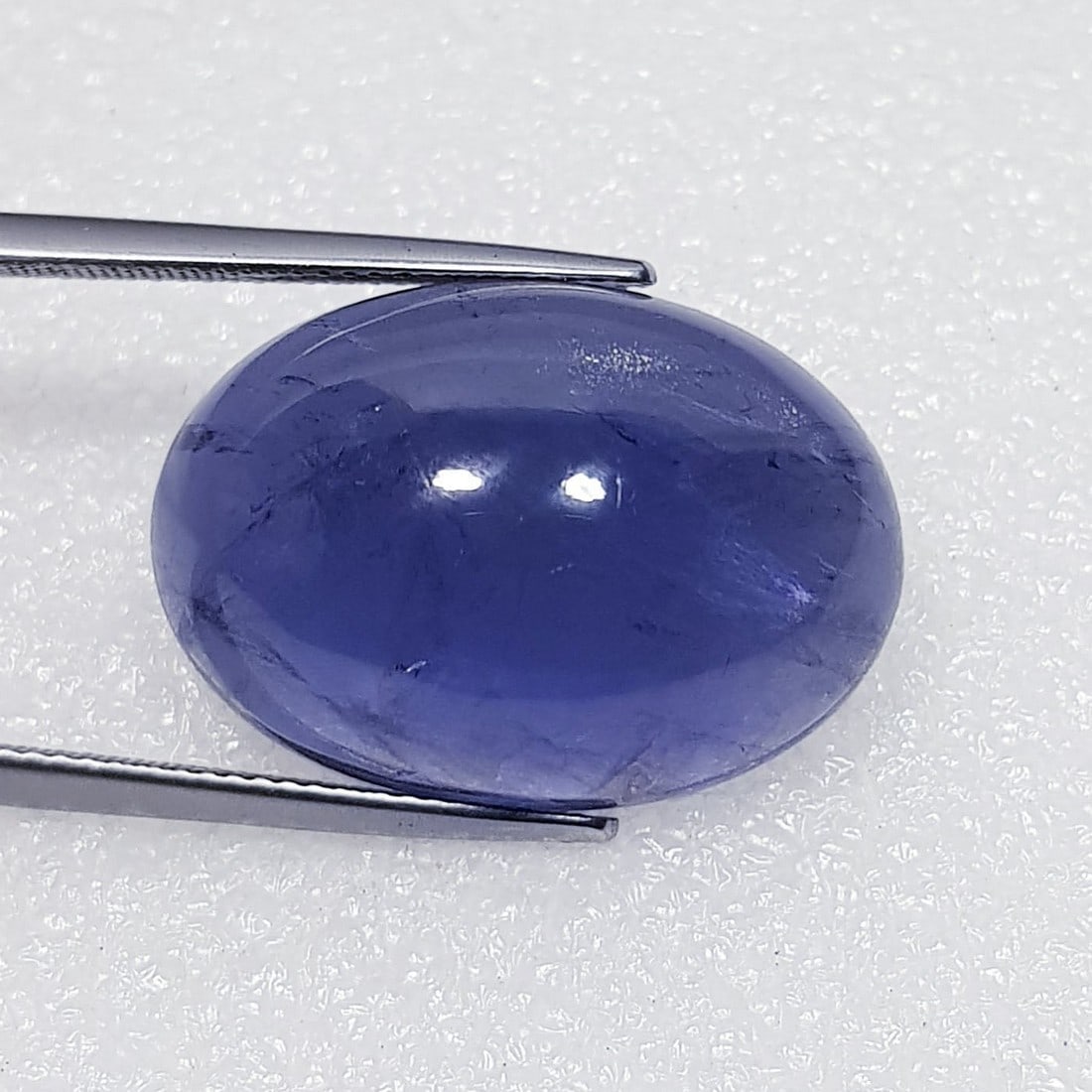 29.90 ctz Fine Collection of NaturalLCabochon Iolite: No Reserve! Title: 29.90 ctz Fine Collection of NaturalLCabochon Iolite Color/Clarity: Blue / VS Gemstone: Sapphire Carat Weights: 29.9 Size: 24.85 x 17.55 x 10.00 Additional Information: Oval Cabocho