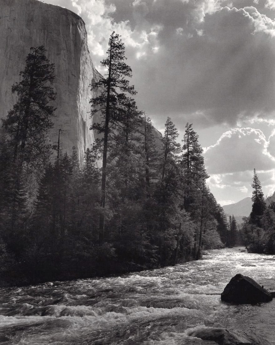 ANSEL ADAMS - El Capitan, Merced River, Clouds, Yosemite, c. 1952: Artist: ANSEL ADAMS Print Title: El Capitan, Merced River, Clouds, Yosemite, c. 1952 Medium: Double Impression Photolithograph Printed 1970’s in the US Image Size: approx. 9.5 x 8” Ansel E