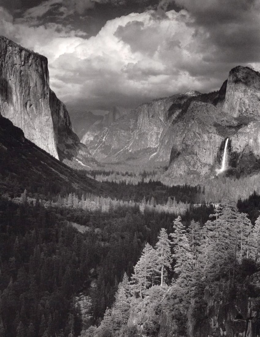 ANSEL ADAMS -Thunderstorm, Yosemite Valley, c. 1945: Artist: ANSEL ADAMS Print Title: Thunderstorm, Yosemite Valley, c. 1945 Medium: Double Impression Photolithograph Printed 1970’s in the US Image Size: approx. 9.5 x 8” Ansel Easton Adams (