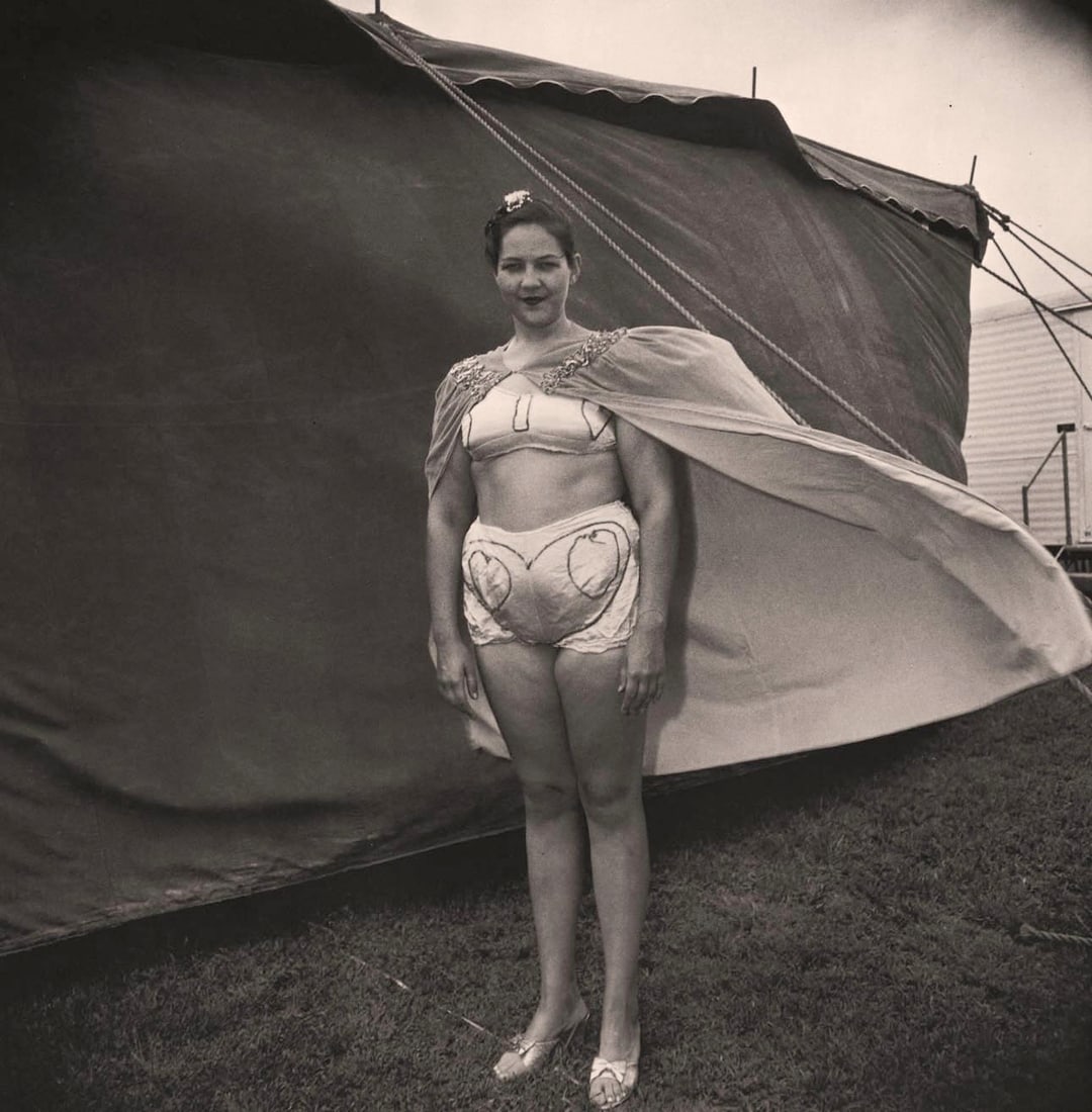 DIANE ARBUS - Girl in her circus costume, MD, 1970: Artist: DIANE ARBUS Print Title: Girl in her circus costume, MD, 1970 Medium: Photoengraving Printed 2000’s in Germany Image size (inches) approx. 8 x 8” Diane Arbus (1923 –1971),was