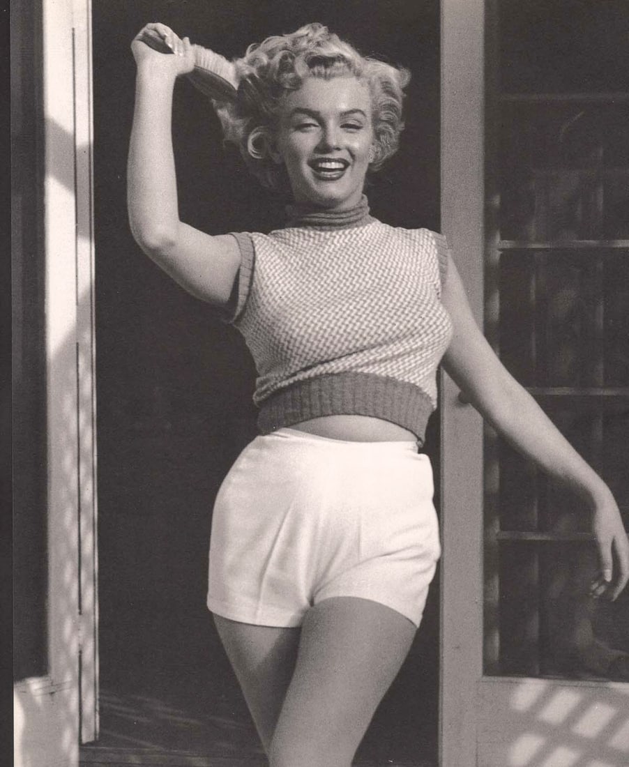 ANDRE DE DIENES - Marilyn Monroe (Norma Jean) Reading: Artist: ANDRE DE DIENES Print Title: Marilyn Monroe (Norma Jean) Medium: Photo-lithograph Printed 1980’s in the USA Image size (inches) approx. 12 x 9” Andre De Dienes De Dienes was a prof