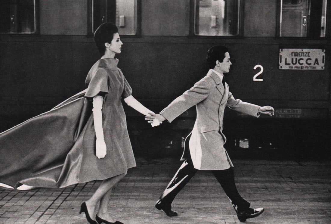 NORMAN PARKINSON - Capucci, Designer, Florence Station 1961: Artist: NORMAN PARKINSON Print Title: Capucci, Designer, Florence Station 1961 Medium: Sheet-fed Gravure Printing Date: 1980's Printed in France Image Size approx: 5 X 7.75 inches Norman Parkinson (19